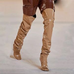 Nude patent boots